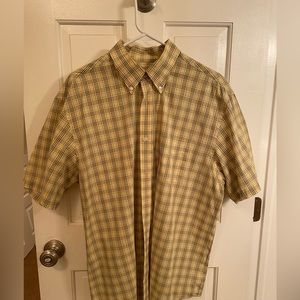 Men’s Yellow and Gray Van Heusen shirt.